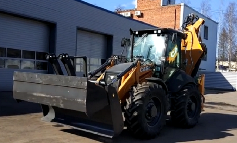 экскаватор погрузчик Case CE 695ST